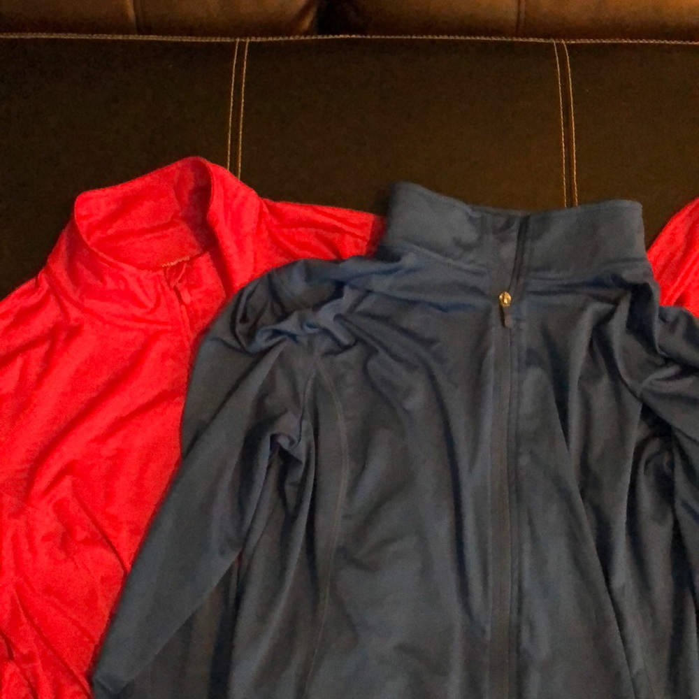 Get both of these new Danskin Now workout zip-ups. Hot pink and electric blue.